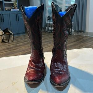 Red cowboy boots. Not sure on a brand. 10D noted on inside of leather.
